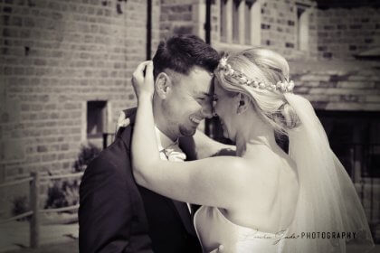 Bride and groom smiling